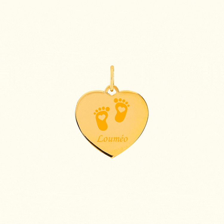 Heart-shaped pendant with engraved baby footprints and 'Louméo' text in gold.