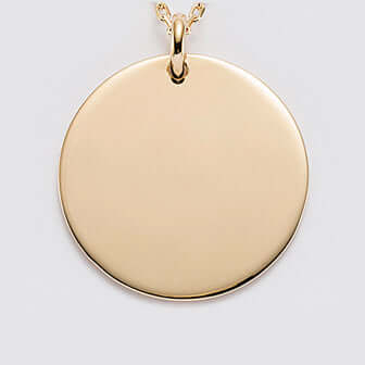 Pendentif rond en acier doré, idéal pour gravures personnalisées avec texte, photo ou motif.