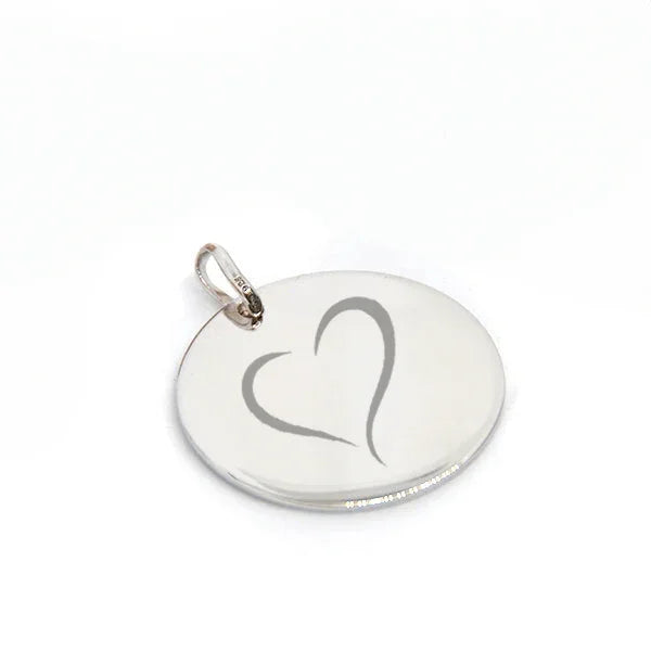 Large round silver pendant engraved with a unique pattern