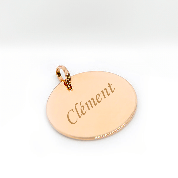 Grand pendentif rond en plaqué or gravé avec le texte 'Clément', finitions élégantes.