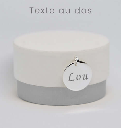 Gravure sur médaillon rond en argent