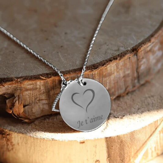 Collier médaille ronde et charm coeur en argent Gravé avec un motif coeur
