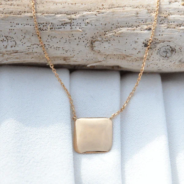 Personalized square pendant in gold EngravingPhoto on chain, elegant jewel on light background