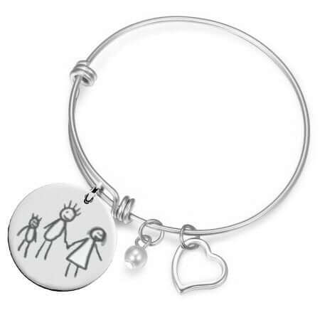 Gravure du dessin fait par votre enfant sur un bracelet avec un pendentif rond