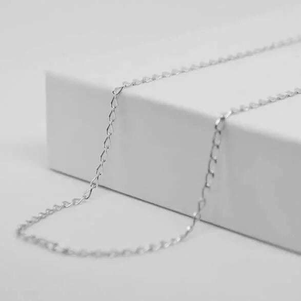 Fine gold chain for personalized heart pendant GravurePhoto, elegant jewel on white background