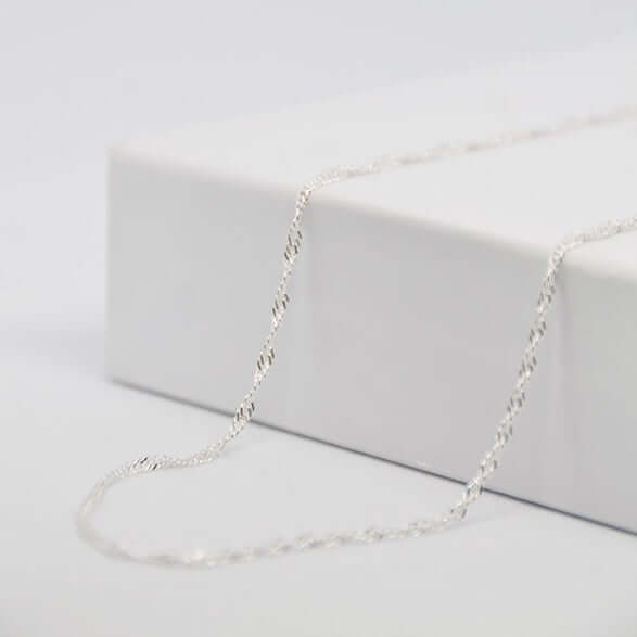 Trouvez votre chaine maille singapour argent sur gravurephoto.com