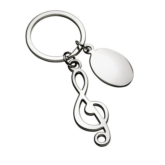 Treble clef key ring engraved with text