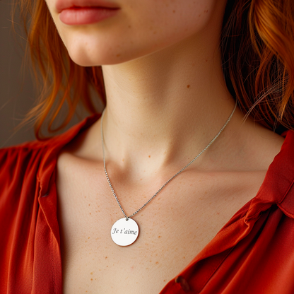 Medium round medallion in silver-plated steel engraved with a text