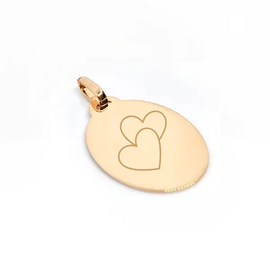 Grand pendentif ovale en plaqué or 750 avec gravure de deux cœurs, parfait pour un bijou personnalisé.