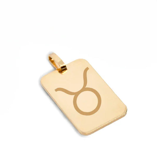 Grand pendentif rectangle plaqué or 750 gravé du motif Taureau, dimensions 3,2 cm x 1,8 cm.
