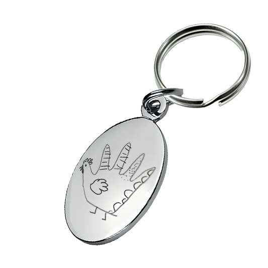 Porte-clés ovale avec un dessin d'enfant gravé