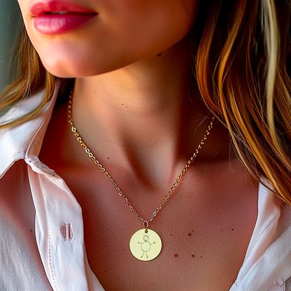 Small round medallion in gilded steel engraved with a drawing